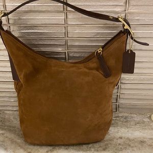 Brown suede coach bag